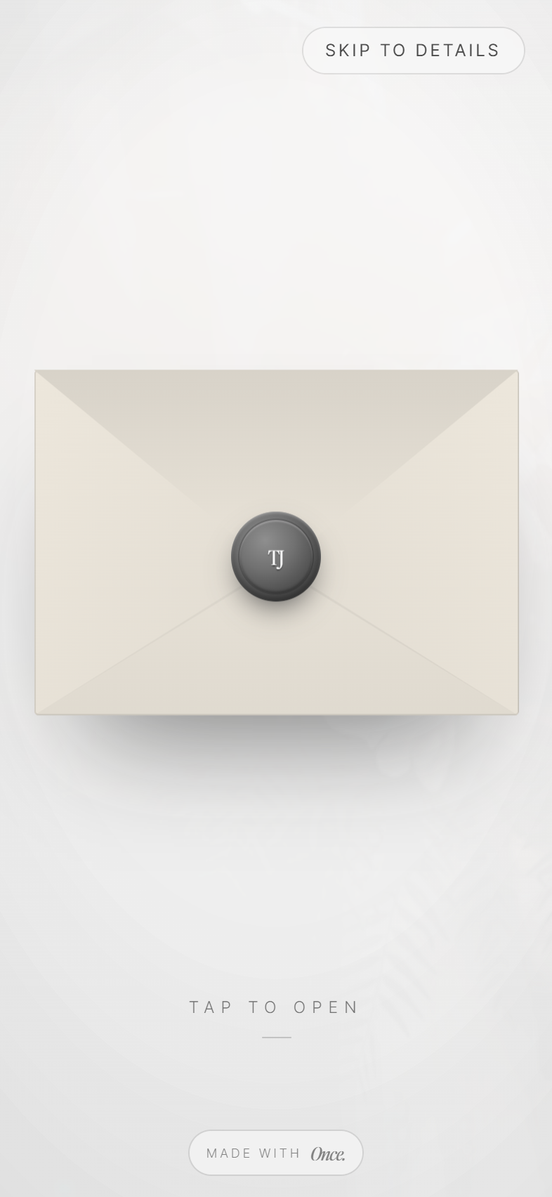 A Once wedding invitation for Tessa and James: a wax-sealed cream envelope with a monogram, waiting to be tapped open.